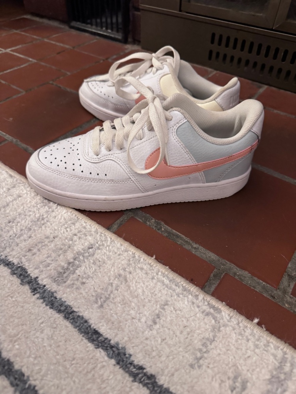 Nike Women's White Sneakers with Pink Swoosh